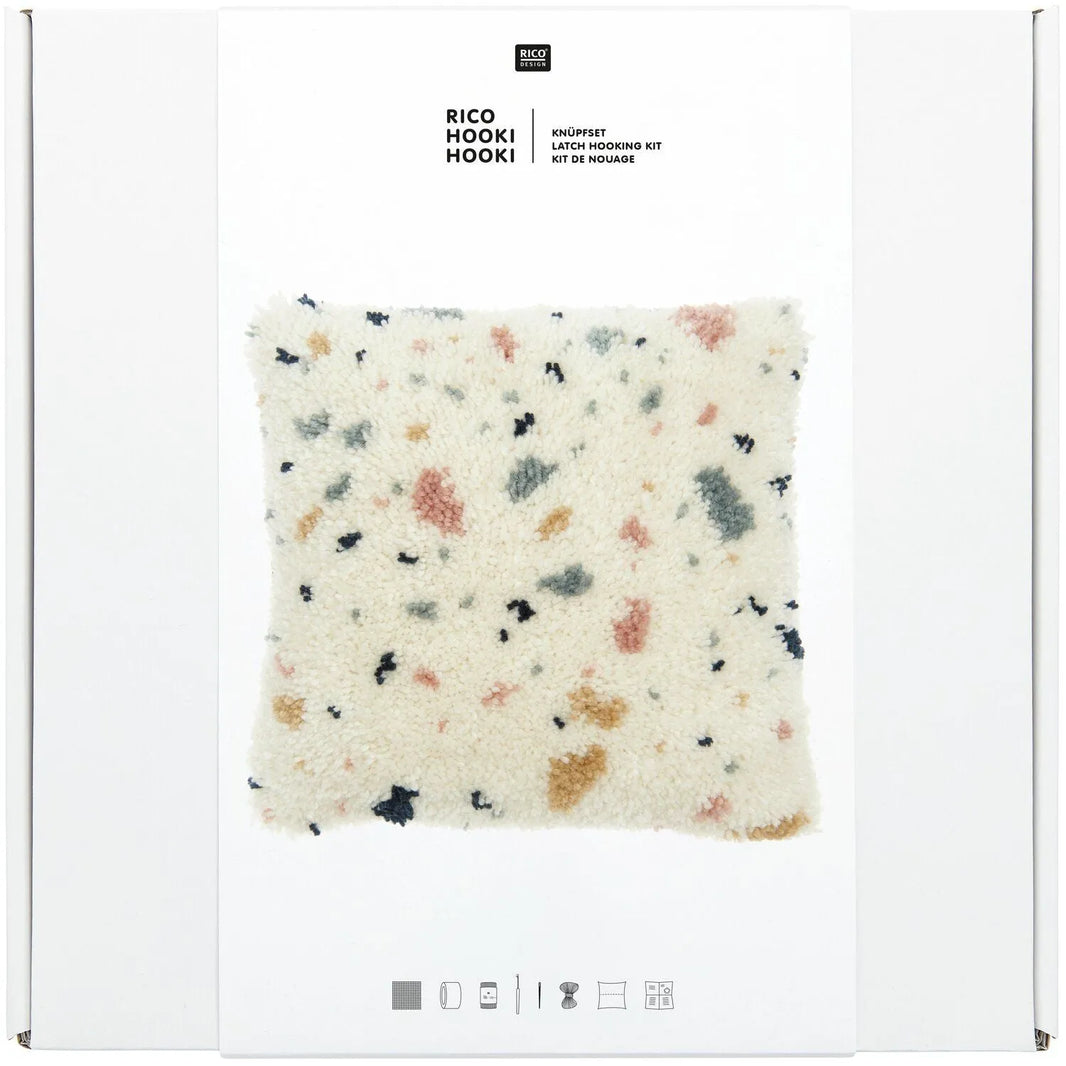 Latch hook rug kit with terrazzo cushion design by Rico Design