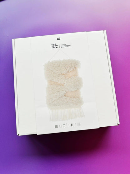 Latch hook rug kit with white landscape design by Rico Design