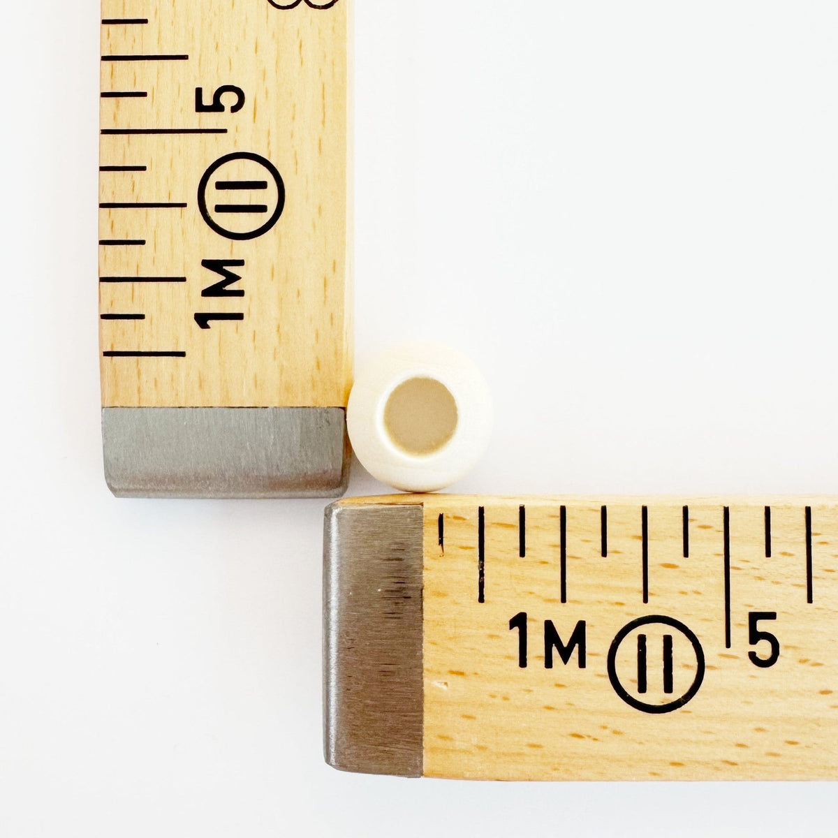 Wooden beads with large holes for cord, detail