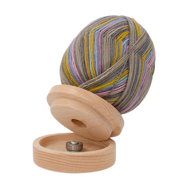 Nurge wooden wool unwinder holding a skein