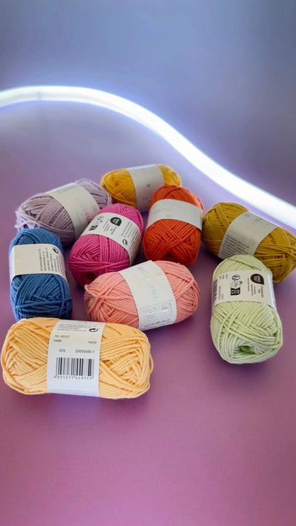 Ricorumi DK cotton yarn balls arranged by colour
